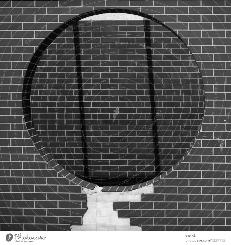 peephole Wall (barrier) Wall (building) Facade Sharp-edged Simple Round Brick Decoration Hollow Large Shopping arcade Pedestrian precinct Black & white photo