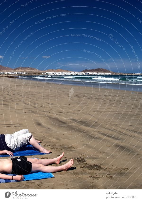 flotsam and jetsam Flotsam and jetsam Search Beach Waves Atlantic Ocean Wet Stone Lava Lanzarote Woman Young woman Famara Towel Sunbathing Sand