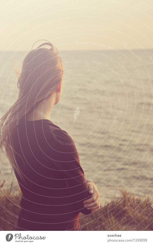 When's the wave coming? Child Girl Hair and hairstyles Back Ocean Water Surface of water Looking Wait Longing Vacation & Travel Summer