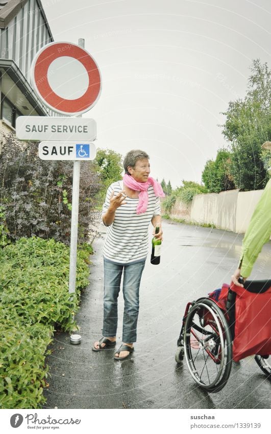 on the road again | sauf service Street Woman Wheelchair booze service French France Wordplay Alcoholic drinks bottle of wine Road sign walking impediment