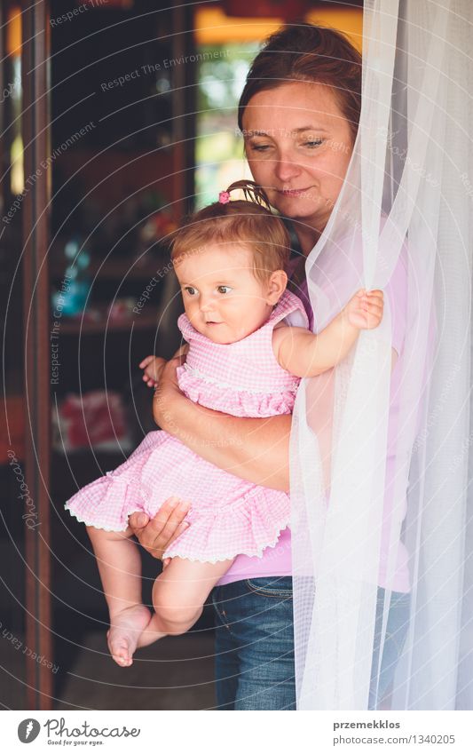 Woman standing at the patio door with her little daughter Lifestyle Summer Child Baby Girl Adults Parents Mother Family & Relations Infancy 2 Human being