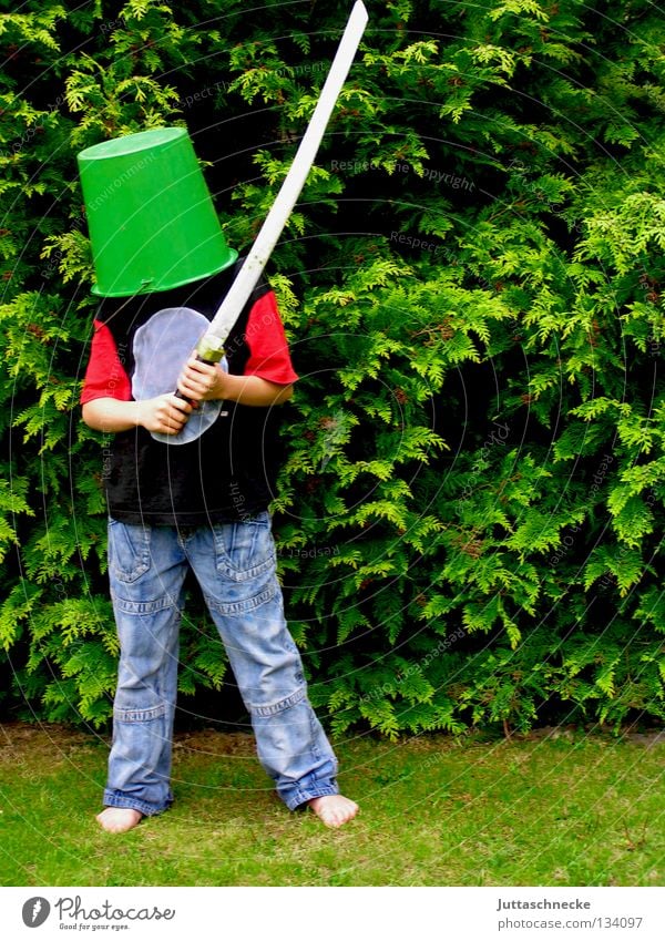 Don Quixote Boy (child) Child Bucket Tub Sword Playing Green Helmet Sporting event Fight Dress up Joy Communicate Knight Garden Protection wooden sword homemade