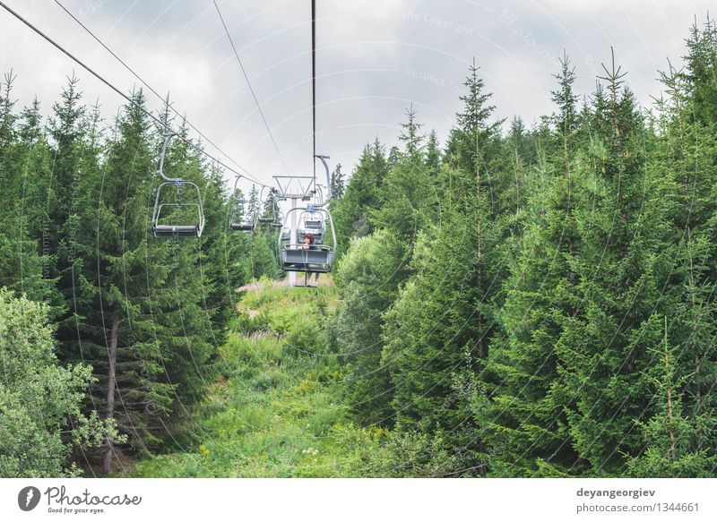 Lift in the mountain. Beautiful Relaxation Vacation & Travel Tourism Freedom Summer Mountain Chair Entertainment Nature Landscape Sky Clouds Grass Forest Alps