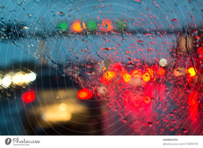 Motorway again Highway Rush hour Traffic jam Rain Rainwater Autumn Weather Windscreen Window Car Window Drops of water Light Floodlight Car headlights