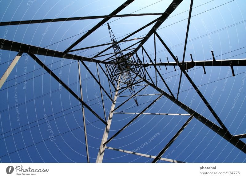 power poles High voltage power line Beautiful weather Wide angle Abstract Dangerous E-on Blue sky cool look something different