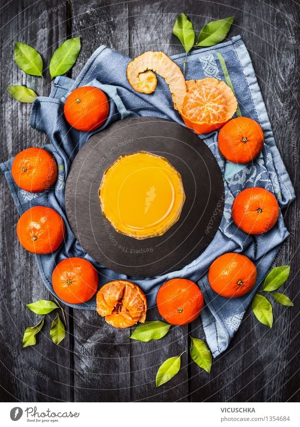 Mandarins with leaves and juice Food Fruit Nutrition Breakfast Beverage Cold drink Juice Glass Style Design Healthy Eating Life Fragrance Tangerine Fresh