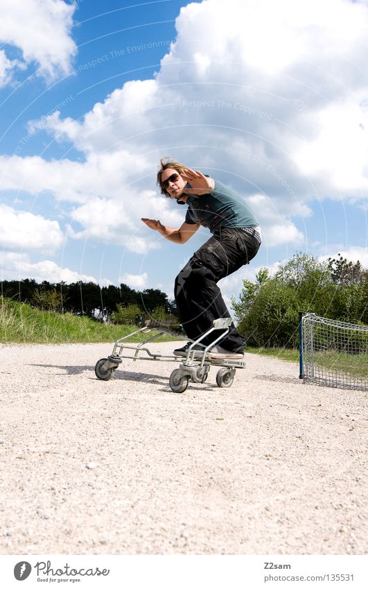 shopping surfer II Clouds Stand Contentment Shopping Trolley Cage Meadow Green Summer Juicy Physics Summery Man Masculine Action Dangerous Blonde Easygoing