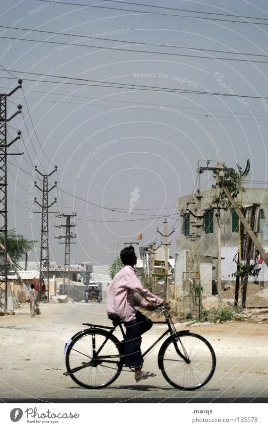 cruising Bicycle Cycling Past Vacation & Travel Tread Pedal Summer Driving Derelict Dry Electricity pylon Sand Rural Physics Hot India Transport cruise