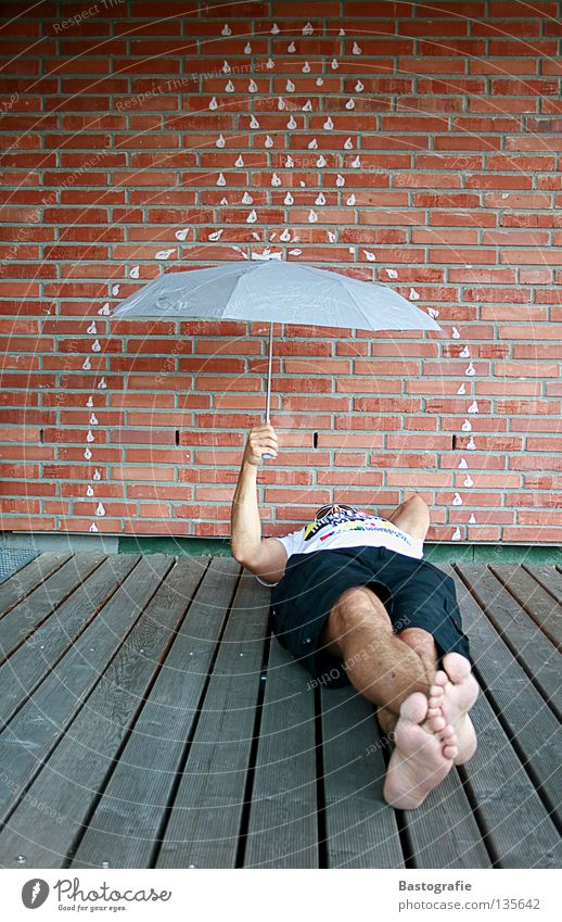 sleeping in the rain Street art Comic Sleep Wet Rain Relaxation Puddle Wall (barrier) Dream Brick Wall (building) Cold Summer Autumn Seasons Rainbow Emotions