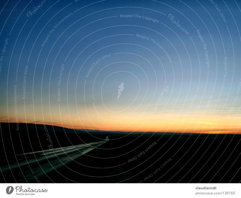 beyond the horizon Motoring Driving Vacation & Travel Twilight Evening Horizon Warm colour Water ditch Asphalt Tar Right ahead Direction Future Sunset Dark