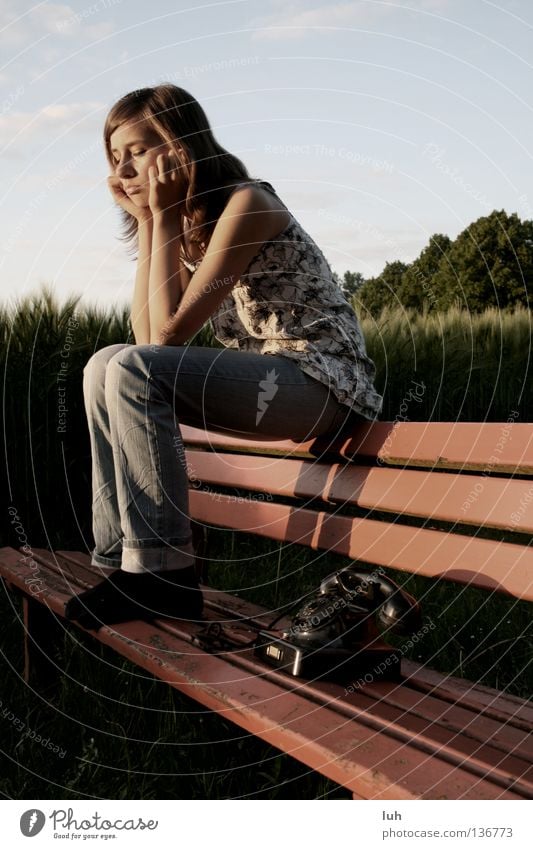 Waiting for his call, she sits there. Telephone Youth (Young adults) To call someone (telephone) Cry Black Emotions Moody Beautiful Hope Sadness Concern Grief