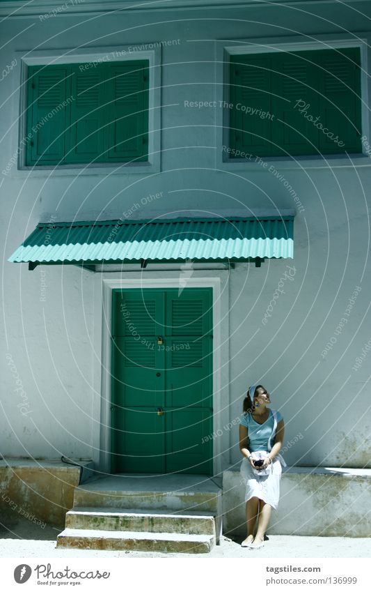 CHILLIN' GREEN ON MALE Green Turquoise Mint green House (Residential Structure) Entrance Window Woman Tourist Tourism Maldives India White Vacation & Travel