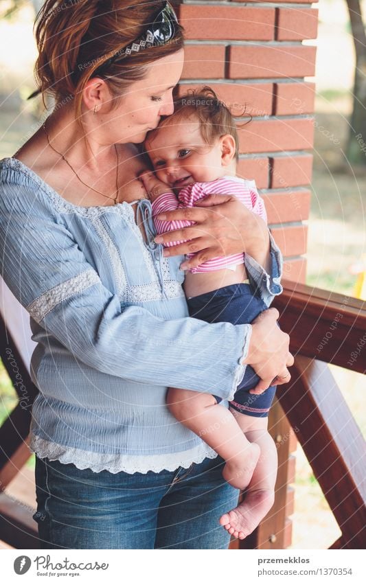 Mom hugging her little baby Lifestyle Joy Happy Beautiful Parenting Child Baby Toddler Girl Woman Adults Parents Mother Family & Relations Infancy 2 Human being