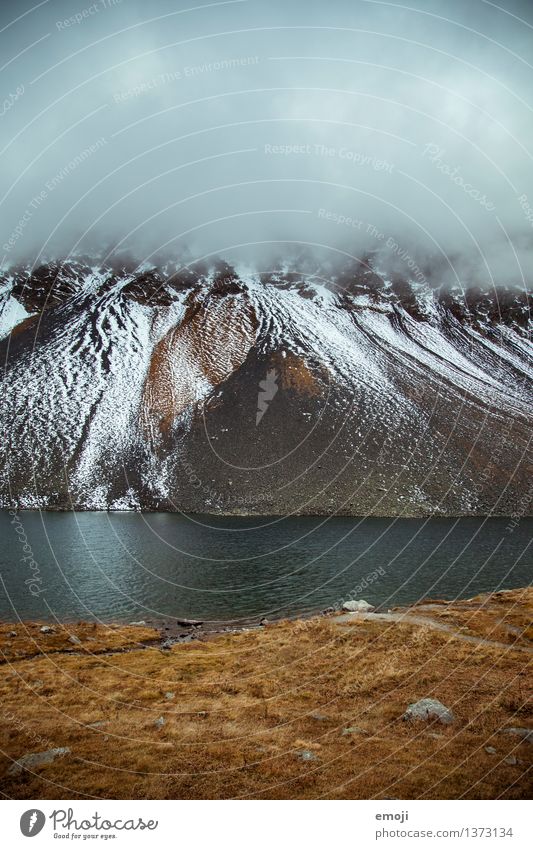 Flüela Pass Environment Nature Landscape Autumn Winter Bad weather Storm Snow Alps Mountain Lake Threat Dark Cold Switzerland Tourism Fog Clouds Colour photo