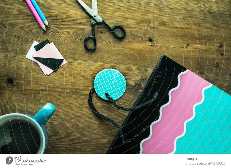 Handicraft lesson: gift wrap with coffee cup, scissors and a nice bag Beverage Hot drink Coffee Cup Leisure and hobbies Playing Home improvement Stationery