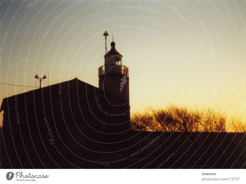 In the evening at the lighthouse Lighthouse Sunset Beach Baltic Sea Evening