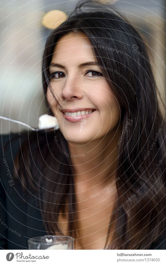 Smiling woman enjoying her cup of cappuccino Eating Beverage Coffee Spoon Lifestyle Happy Relaxation Business Woman Adults Brunette To enjoy Sit Aromatic