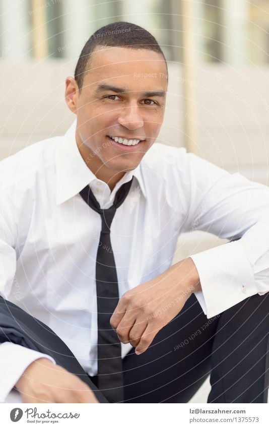 Attractive smiling businessman with a loosened tie Lifestyle Style Happy Face Summer Business Man Adults Teeth Shirt Suit Tie Smiling Laughter Sit