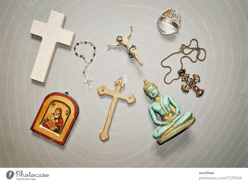 FAITH Religion and faith God Symbols and metaphors Crucifix Christian cross holy water Icons Rosary Buddha Jesus Christ Catholicism Christianity Buddhism