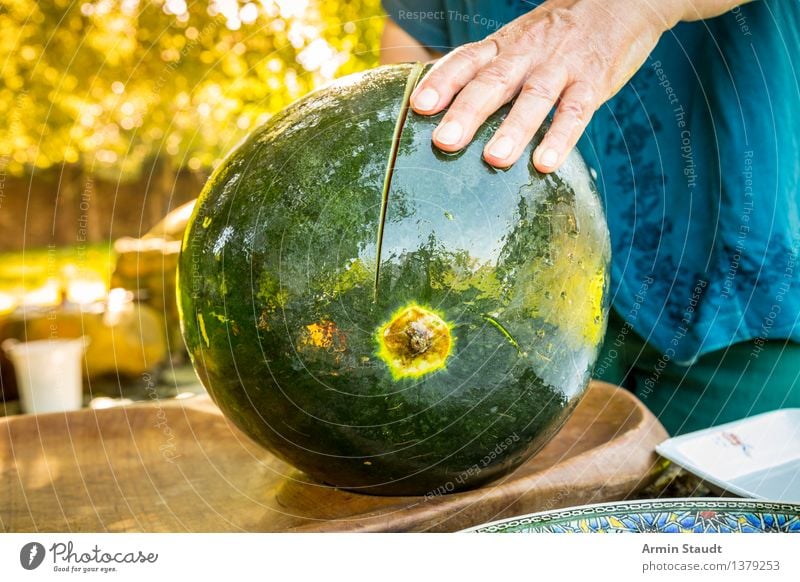 Cut melon Food Fruit Water melon Melon Nutrition Picnic Vegetarian diet Knives Lifestyle Luxury Healthy Summer Human being Hand 1 Nature Sunlight Spring