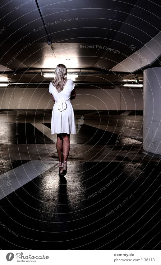 Goodbye Woman Dress White Black Dark Stand Going Subsoil Parking garage Parking level Stripe Concrete Cement Brown Blonde Fear Reflection Light Long exposure