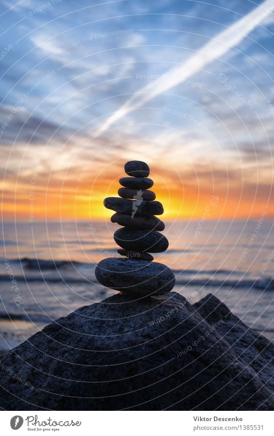 Stable pyramid of several stones Spa Vacation & Travel Summer Sun Beach Ocean Nature Landscape Sky Coast Baltic Sea Stone White Peace inukshuk water Sunset