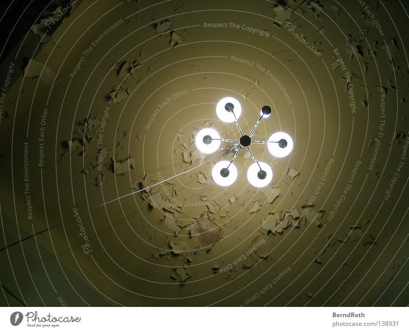 colour loss Derelict Decline Ruin Dark Light Wall (building) Staircase (Hallway) Plaster Wall (barrier) Lamp Hanging lamp Transience Blanket Above