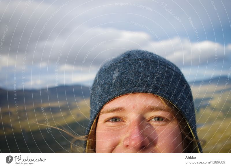 Half face of a young woman in the frontal, curious, hair blown away by the wind Adventure Far-off places Freedom Young woman Youth (Young adults) Head Eyes 1