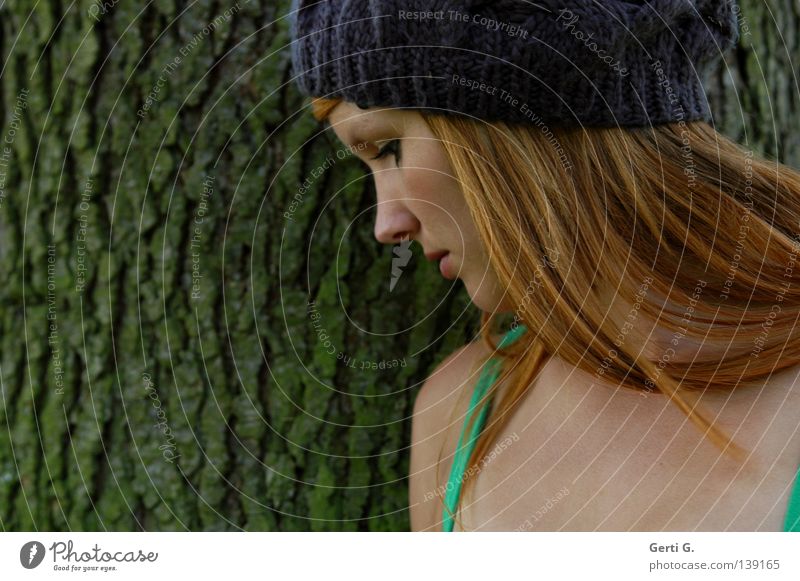 cap girl Tree bark Furrow Woman Young woman Calm Think Neutral Beautiful Long-haired Red-haired Cap Portrait photograph Silhouette Profile Side Trust Nature