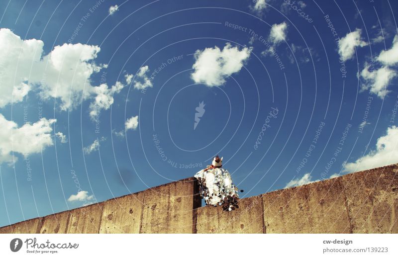 KING CHAIR White Suit Eyeglasses Wall (building) Gray Gloomy Absurdity Funny Jump Hop Hover Horizon Man Masculine Hand Clue Direction Silo Style Sequin Design