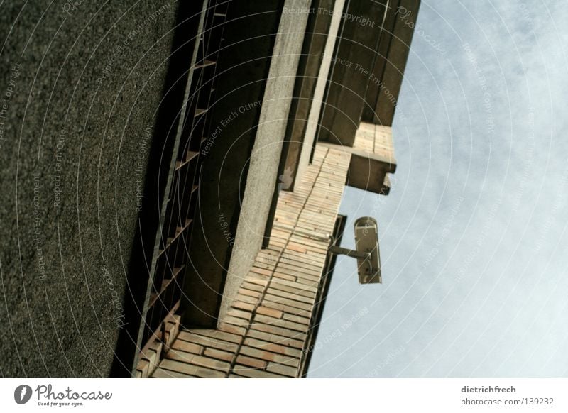 Put your hands up! Surveillance Wall (barrier) House (Residential Structure) Gray Structures and shapes Dangerous Detail Fear Panic Sporting event Competition