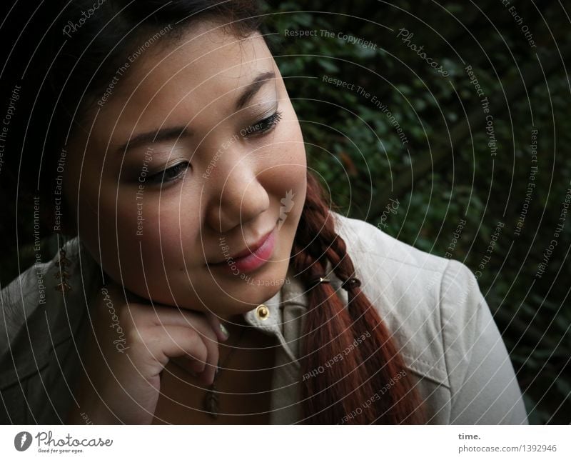 thoughtful woman with double braid Feminine 1 Human being Forest Jacket Black-haired Red-haired Long-haired Braids Observe Think To enjoy Smiling Looking Dream