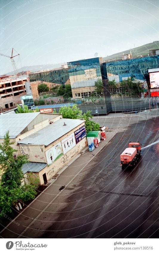 liquid_asphalt Town Sky House (Residential Structure) Asphalt Store premises Building Crane Clouds Siberia Industry Transport street Car cleaning Houses