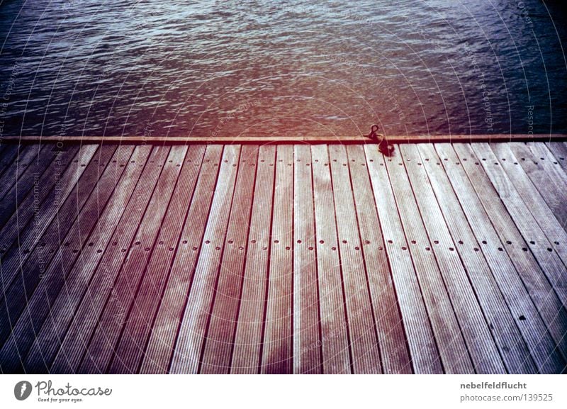 footbridge Footbridge Wood Wooden board Ocean Lake Summer Watercraft Drop anchor Anchor Moody Vacation & Travel Red Retro Cold Physics Lomography Vignetting