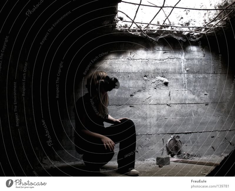 bunkers Respirator mask Opening Grating Closed Captured Light Cone of light Crouch Creepy Dark Gloomy Wood Derelict Woman Odor Mask veined Hollow Beam of light