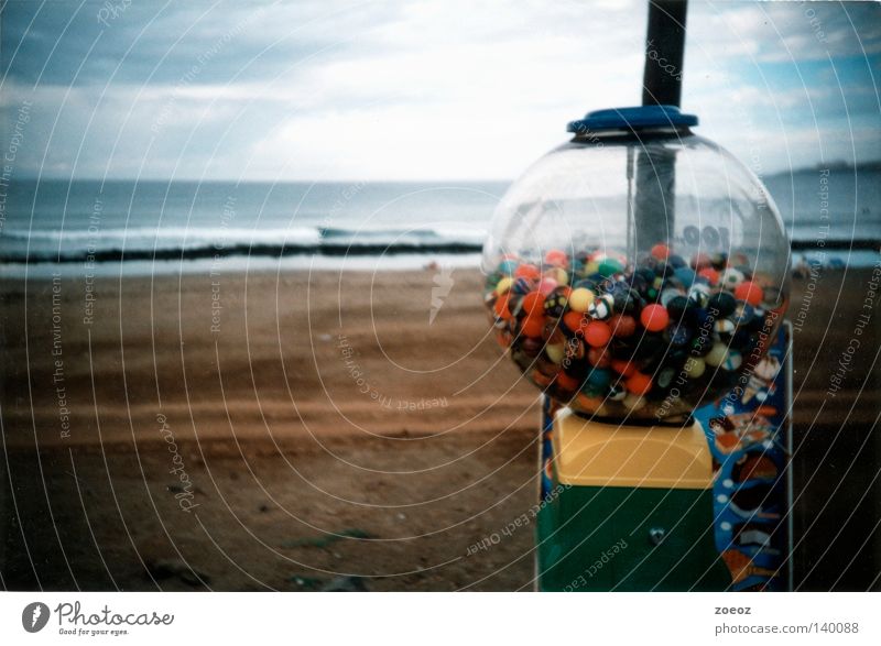 chewing gum strand Beach Promenade Candy Vacation & Travel Bad weather Gumball machine Ocean Earth Sand Lomography Clouds Multicoloured