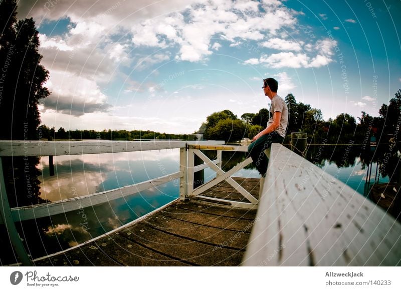 Sittin' on the Dock of the Bay Footbridge Water Lake Summer Sky Clouds Wait Man Relaxation Think Undisturbed Vacation & Travel Loneliness Twilight Cumulus Jetty