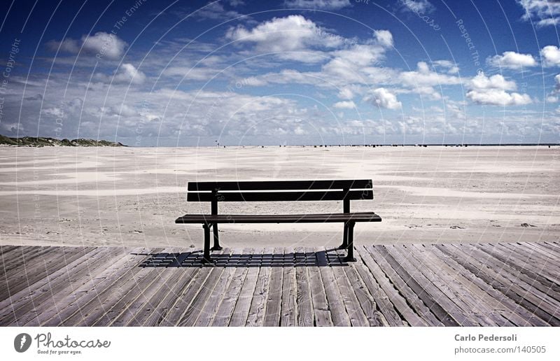 sandbank Bench Empty Loneliness Far-off places Wood Old Weathered Footbridge Beach Sand Ocean Coast Beach dune Beach chair Sky Clouds Low tide Plank Free