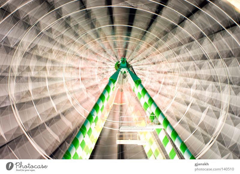 twister Ferris wheel Fairs & Carnivals Duesseldorf Light Night Night shot Long exposure White Green Scaffold Rotate Rotation Theme-park rides Events Height