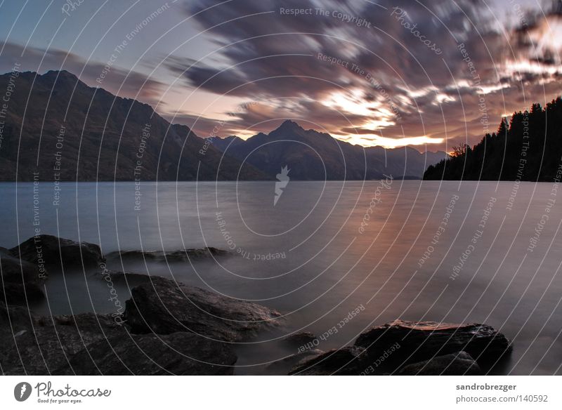 Lake Wanaka New Zealand Sunrise Sunset Calm Long exposure Morning Clouds Dark South Island Sky Gray Comforting Loneliness Longing Cold Soft Delicate Liquid