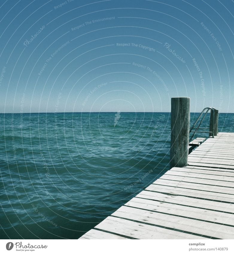 Wooden jetty by the sea Footbridge Ocean Lake Relaxation Plank Vacation & Travel Summer Hot Physics Refreshment Sunbeam Beach Sailing Aerial photograph