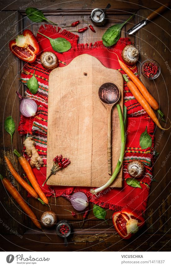 Fresh vegetables around chopping board with cooking spoon Food Vegetable Herbs and spices Nutrition Organic produce Vegetarian diet Diet Bowl Spoon Style Design