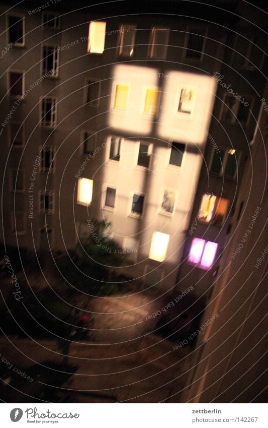 Night from above Window Facade House (Residential Structure) Courtyard Backyard Town house (City: Block of flats) Window transom and mullion Night light Light