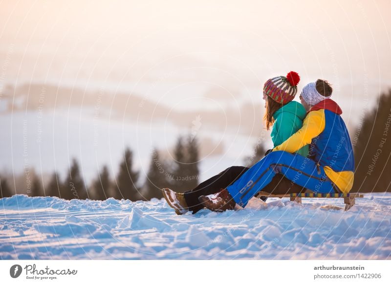 Tobogganing in the twilight hours Lifestyle Joy Leisure and hobbies Sleigh Vacation & Travel Tourism Trip Winter Snow Winter vacation Winter sports Human being