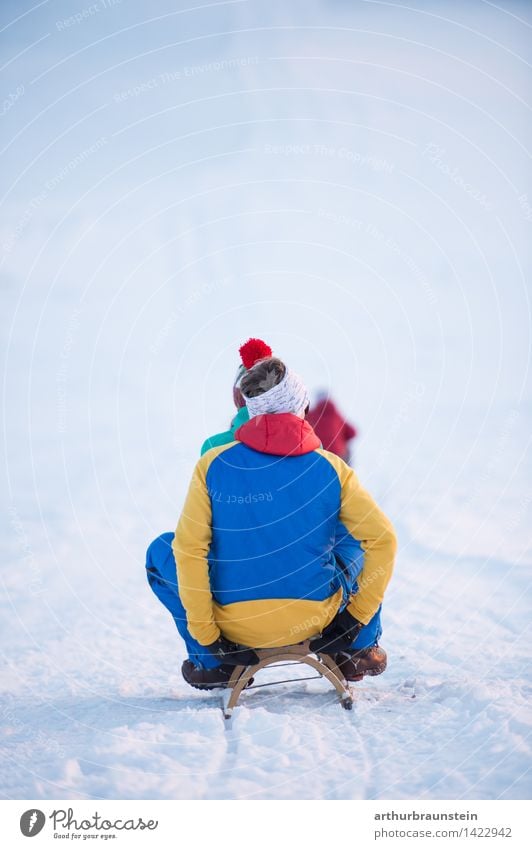 Sledging in winter Joy Leisure and hobbies Sleigh Tourism Trip Winter Snow Winter vacation Winter sports Human being Masculine Feminine Child Young woman