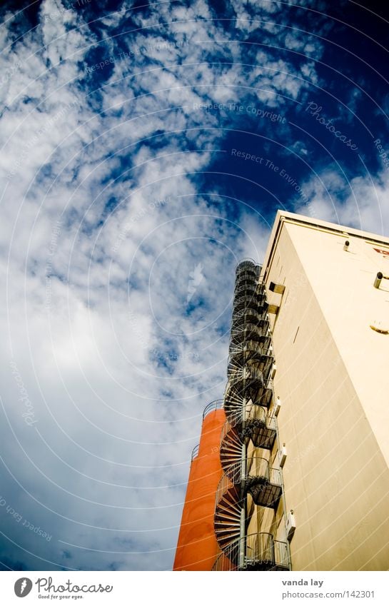 Stairway to heaven Clouds Contrast Stairs Winding staircase Industrial plant Industrial construction Silo Building House (Residential Structure) Orange Industry