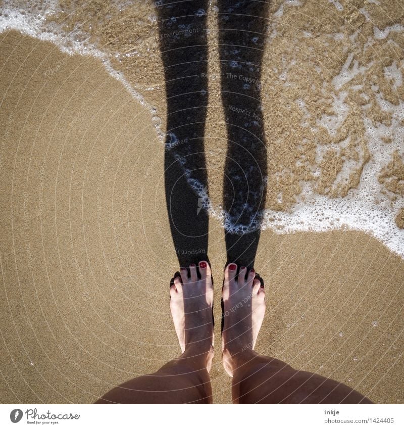 I'm standing in the ocean just next to it. Lifestyle Leisure and hobbies Vacation & Travel Tourism Summer Summer vacation Sun Beach Ocean Woman Adults