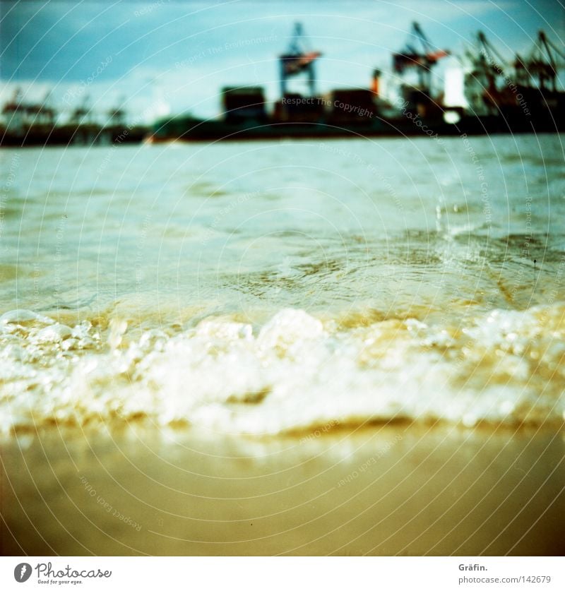 rolling home Beach Waves Work and employment Industry Nature Water Sky River Harbour Navigation Container ship Watercraft Movement Wet Brown Yellow Gray Black