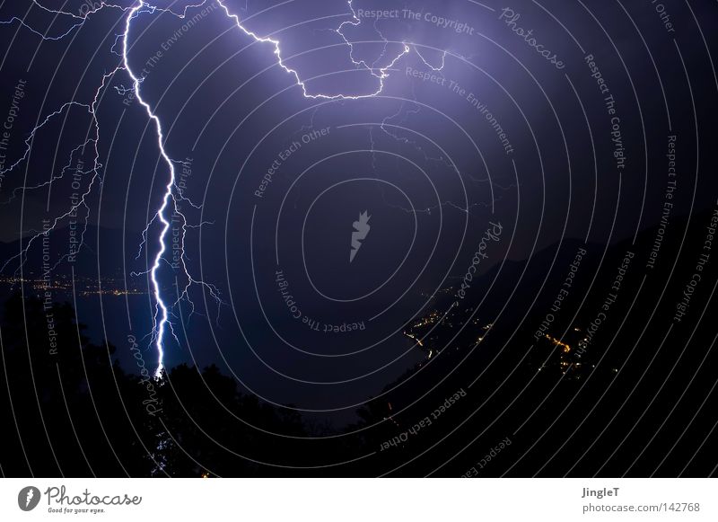 lightning bolt Night Dark Dreary Bad weather Clouds Unload Lake Tree Mountain village Village Lightning Caught by a speed camera Crash Loud Force of nature