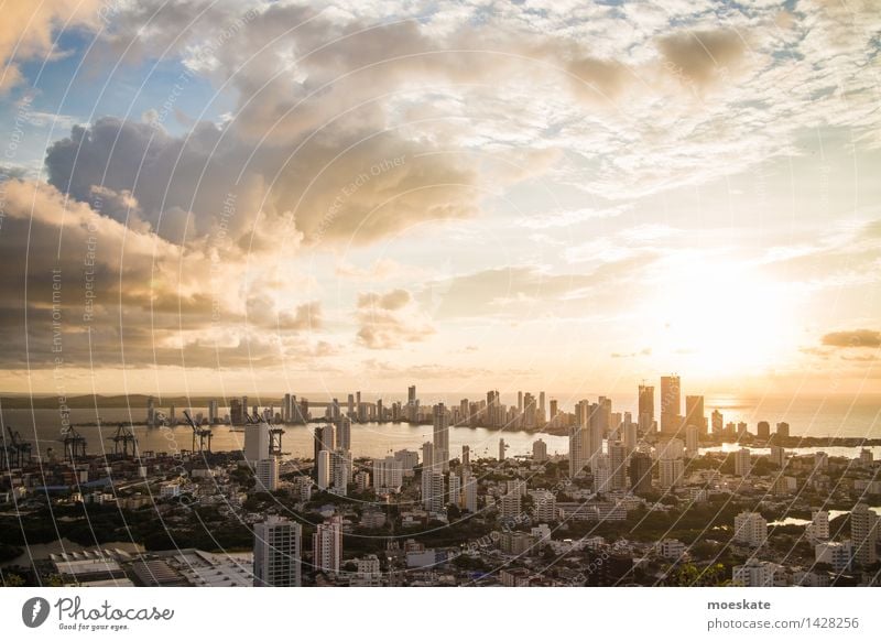 Cartagena De Indias Clouds Horizon Sun Coast Town Downtown Skyline Populated House (Residential Structure) High-rise Bank building Industrial plant Blue Gold